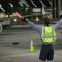 AUGUST – Honorable Mention - Warta Wands<br />Donald Peterson, Local Lodge 1487, United Airlines, O’Hare Airport, Chicago, IL<br />On the last arrival of the night, Dan Warta and Mike Salerno show the proper procedure for receiving an aircraft.<br />